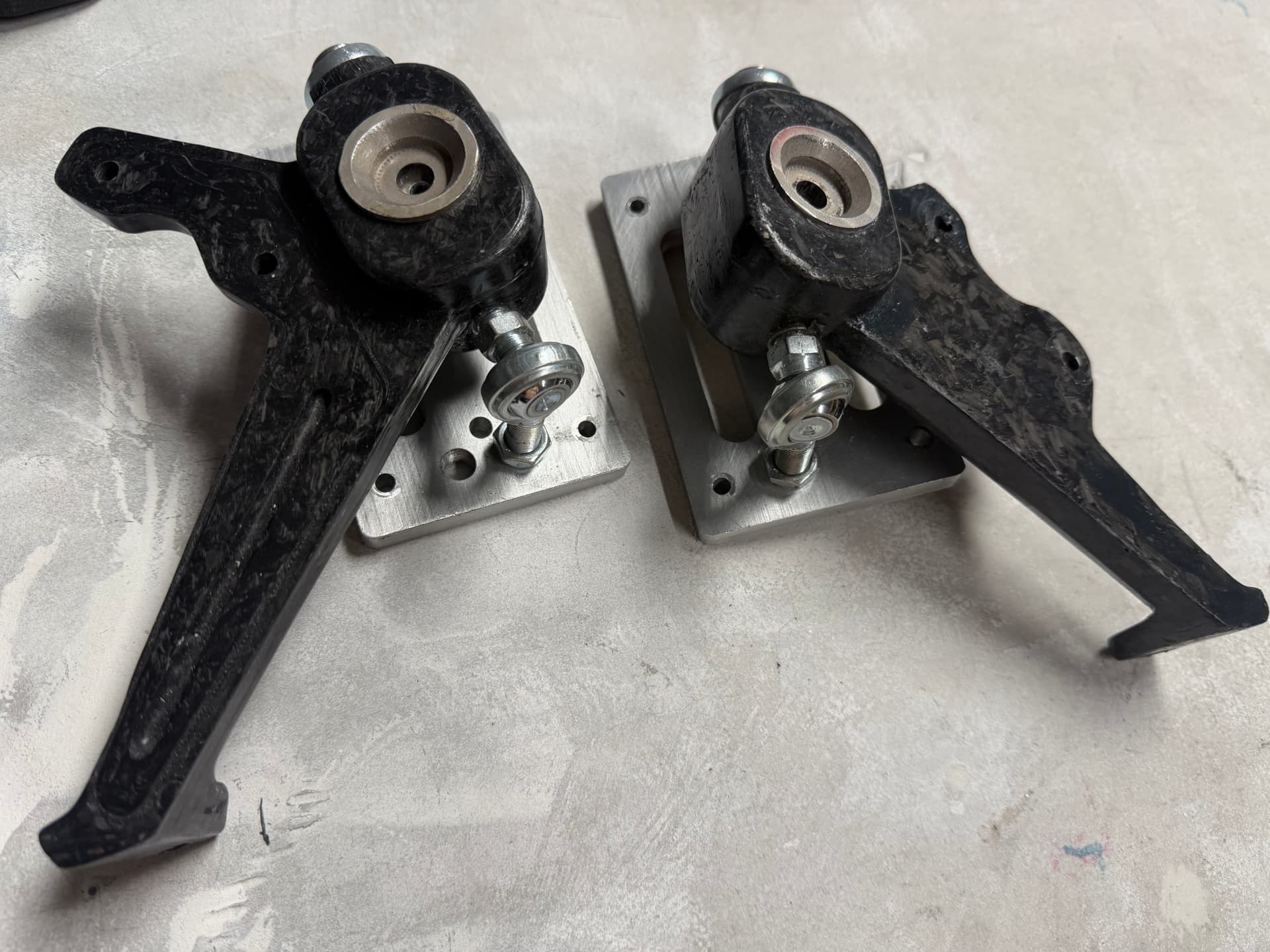 Rocker arms with rod ends